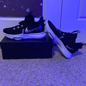 These are Nike basketball shoes don’t know the exact name but they are brand new